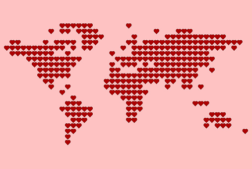 World map consisting of red hearts on pink