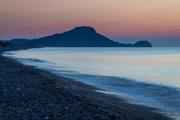 Afandou sea beach in Rhodes at sunrise of sunny summer day. Afandou sea beach in Rhodes at sunrise of sunny summer day, Greece, Europe. afandou stock pictures, royalty-free photos & images