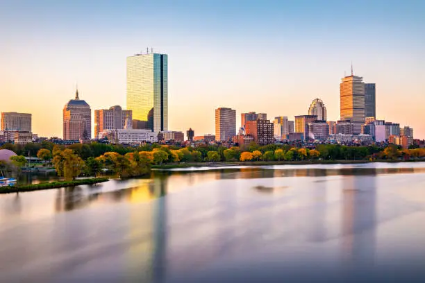 Photo of View of the Beacon Hill and Back Bay Boston City Skyline and Charles River at Sunset, Massachusetts, USA