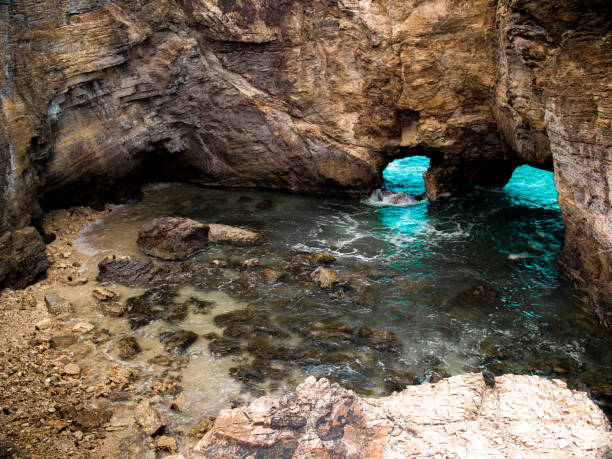 istock devil's hole david's hole beach cliff cave on st. martin island 1446005327