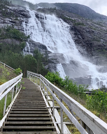 Beautiful waterfall and staircase in Norway.