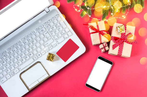 istock Online purchase of Christmas gifts using a laptop 1446005690