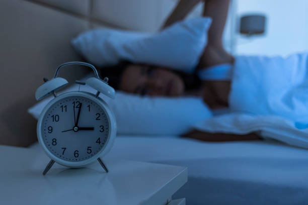 istock Sleepless woman suffering from insomnia, sleep apnea or stress. 1446011445
