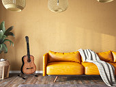 istock Cozy Interior with Empty Beige Wall Leather Sofa and a Guitar 1446014209