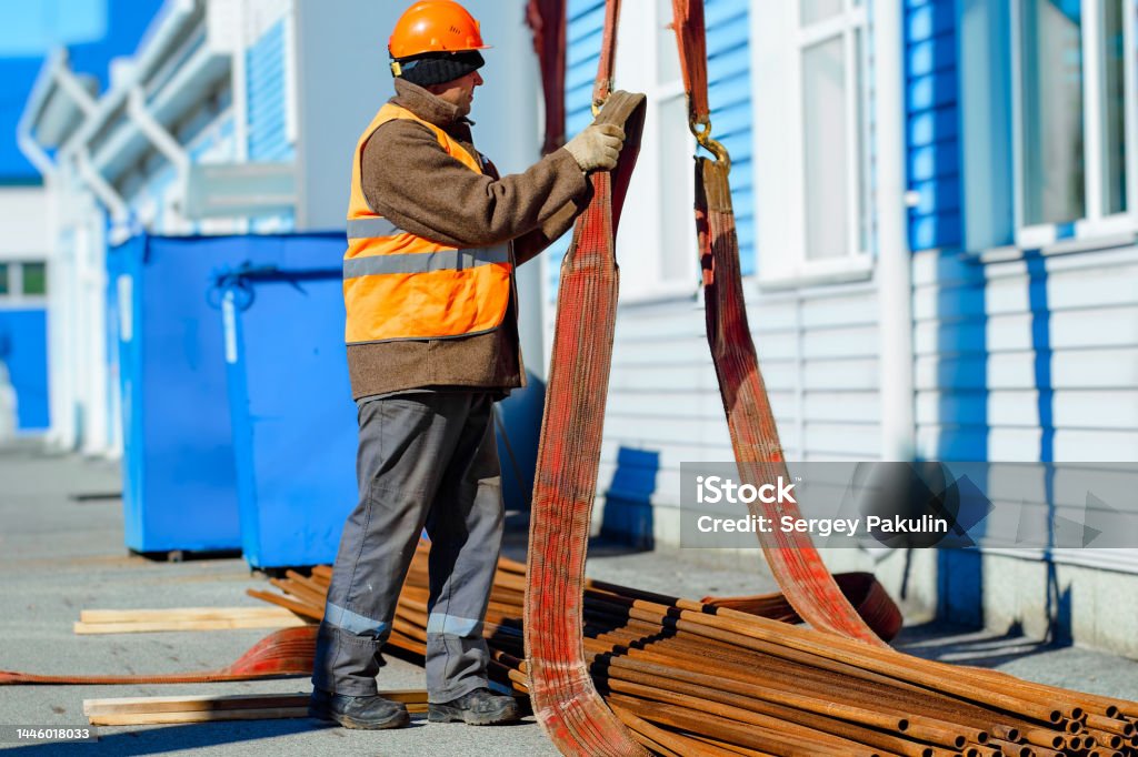 Stack Pipe Material Loading Slinger Stacks Thin Metal Pipes In Stack On Construction Site Closeup ...