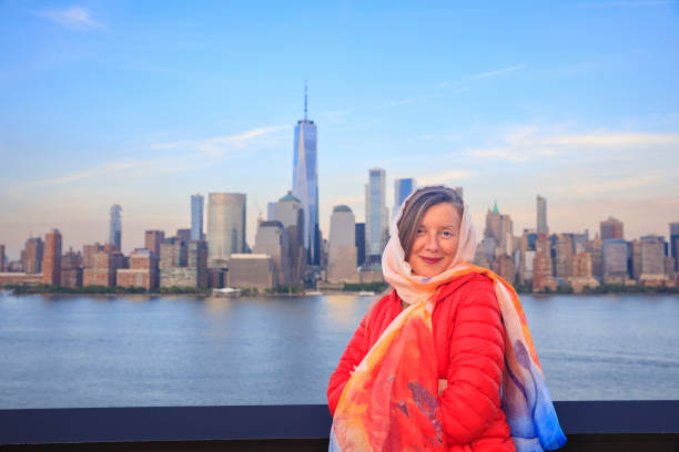 Pretty active women Long blonde hair enjoying in Panorama of New York City skyline Lower Manhattan Pretty active women Long blonde hair enjoying in Panorama of New York City skyline Lower Manhattan and the Freedom Tower Panoramic new york marathon photos stock pictures, royalty-free photos & images