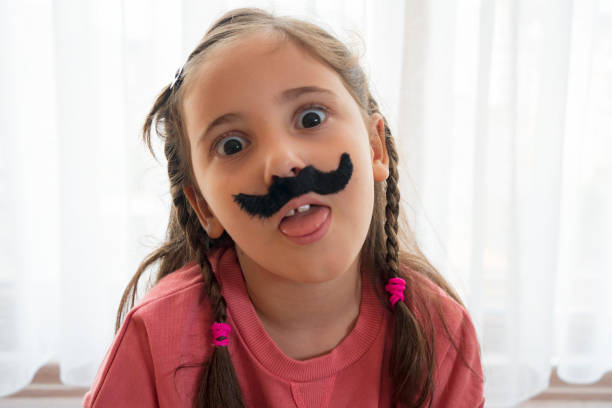istock Mustached Little Girl 1446019952