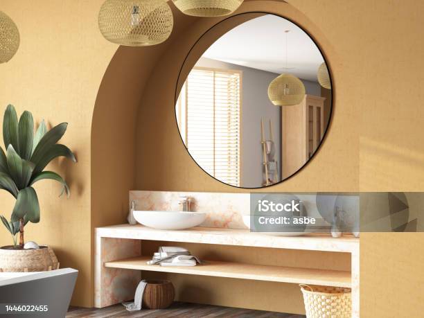 Cozy Beige Bathroom With A Sink And Wooden Furniture Stock Photo - Download Image Now
