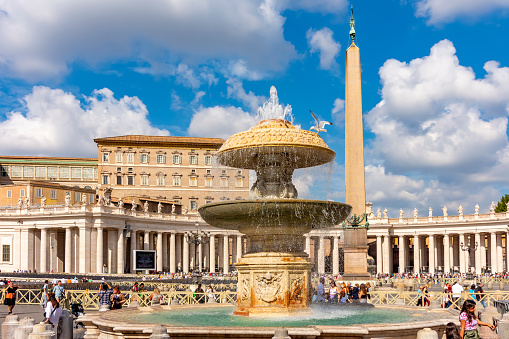Vatican - October 2022: Fountain and Egyptian obelisk on St Peter's square