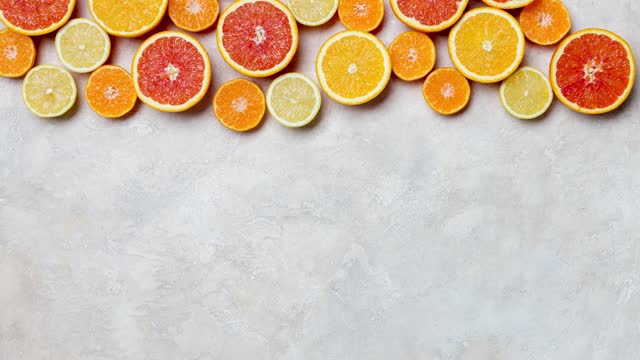 Frame with citrus at light background