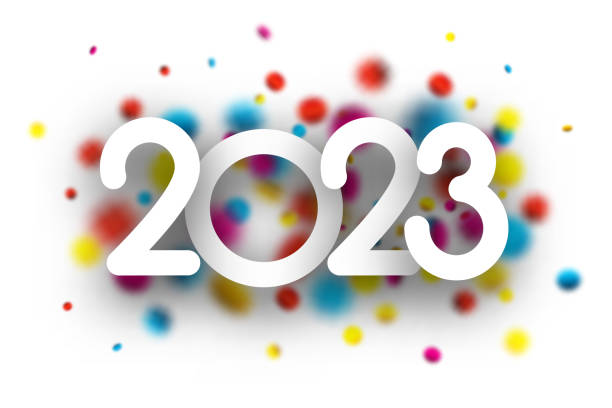istock White paper 2023 sign on blurred colorful round spot confetti background. 1446027534