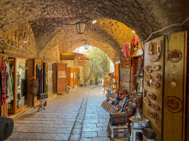 Famous and Historic Mediterranean Coastal Town Byblos, Lebanon - Tourist attractions with restaurants and boats in Lebanon - view from the ocean Famous and Historic Mediterranean Coastal Town Byblos, Lebanon - Tourist attractions with restaurants and boats in Lebanon - view from the ocean phoenicia stock pictures, royalty-free photos & images