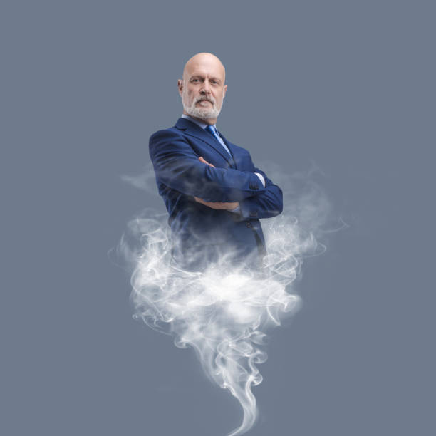 istock Genie businessman appearing with smoke 1446031242