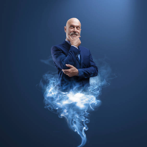 istock Business executive genie appearing and smoke 1446031505