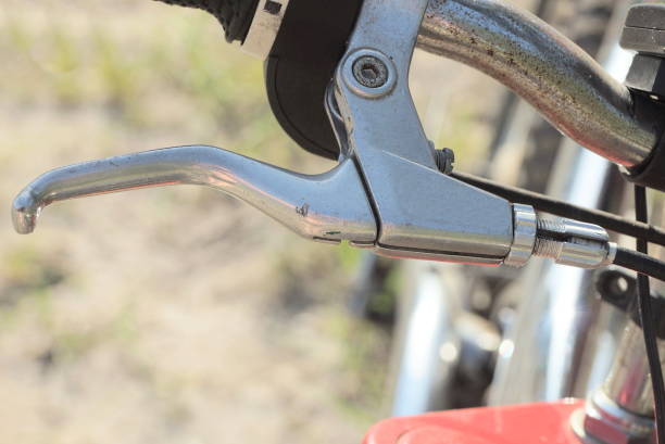 istock part of a bicycle handlebar with a white black metal handbrake 1446034270