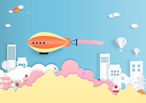 Bakery background concept. The airship flying in the sky with a bakery in a cloud, a town, and a hot air balloon. Paper art style.