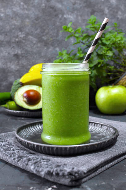 istock Fresh avocado smoothie with fruits. 1446039185