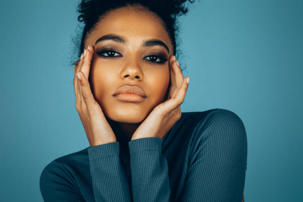 istock Beautiful afro woman with perfect make-up 1446040387