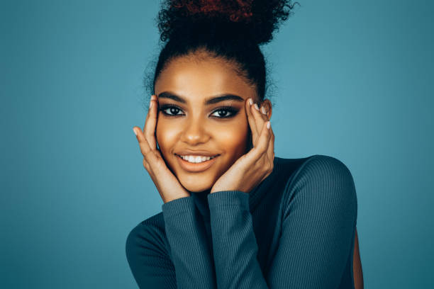 istock Beautiful afro woman with perfect make-up 1446040417