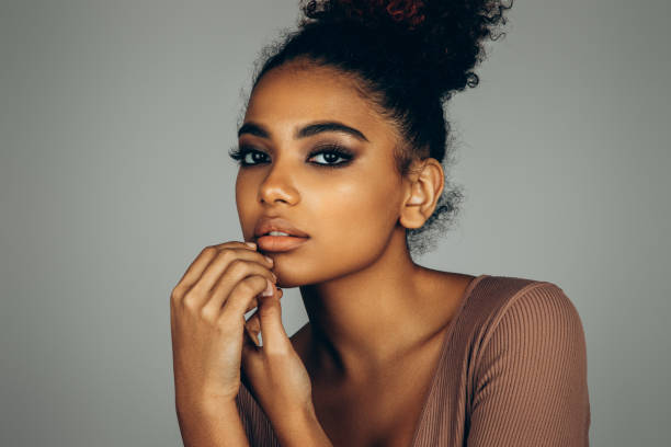 istock Beautiful afro woman with perfect make-up 1446040489
