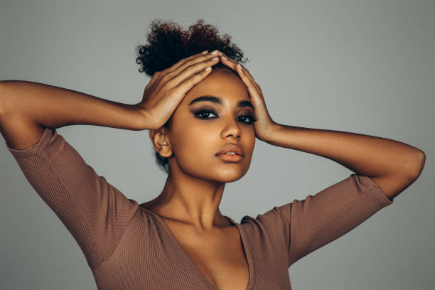 istock Beautiful afro woman with perfect make-up 1446040536