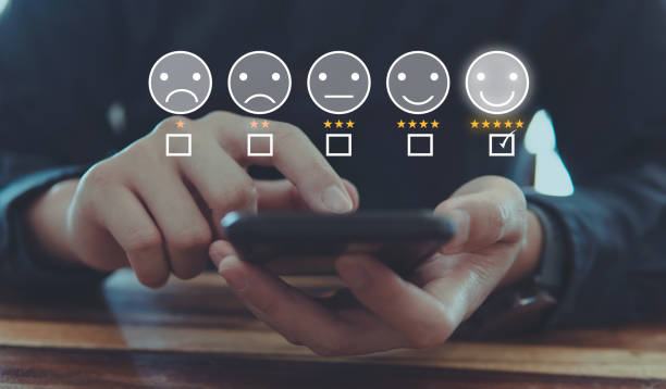 istock customer review by smile face icon and five star feedback, positive customer feedback testimonial. 1446040961
