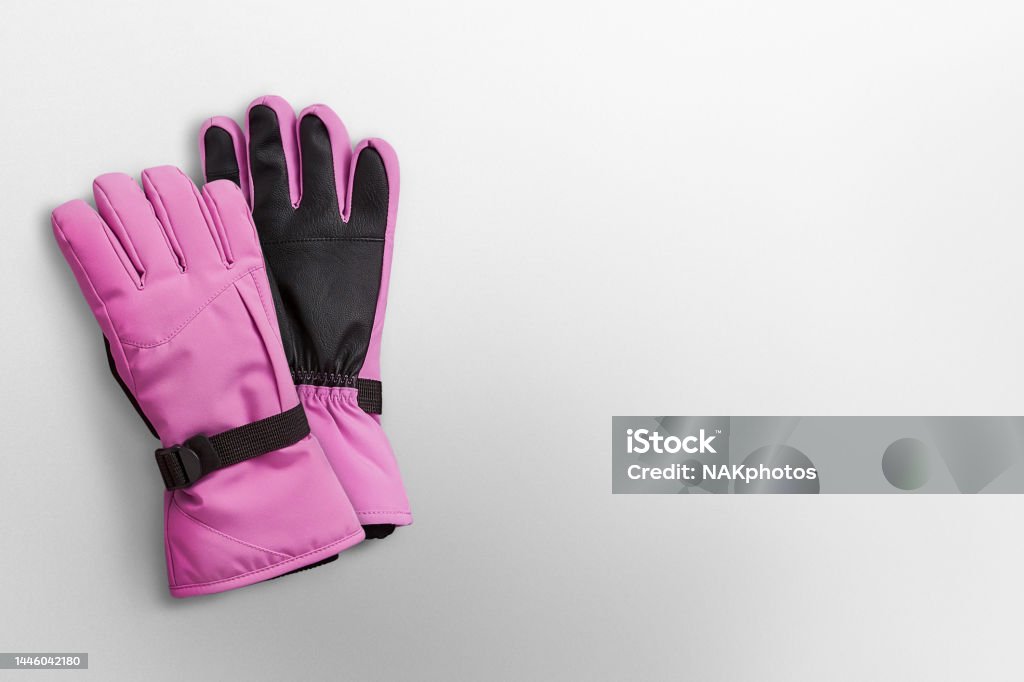 Pink winter gloves on a white background Glove Stock Photo