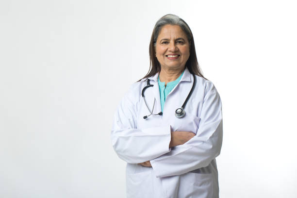 istock Confident female doctor on white background 1446042362