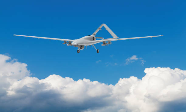 istock Bayraktar TB2 unmanned aerial vehicle gliding through the clouds. 1446043196