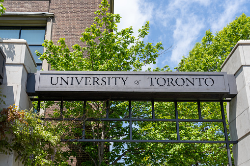 Toronto, Canada - May 19, 2022: University of Toronto sign in downtown Toronto.  The University of Toronto (U of T) is a public research university