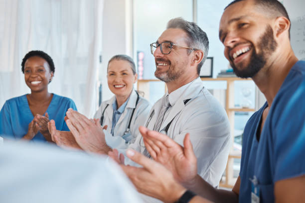 doctors, nurses and teamwork collaboration clapping after medical presentation, healthcare meeting and hospital medicine success. smile, happy and excited insurance men and women with winner gesture - research medical student doctor clinic imagens e fotografias de stock