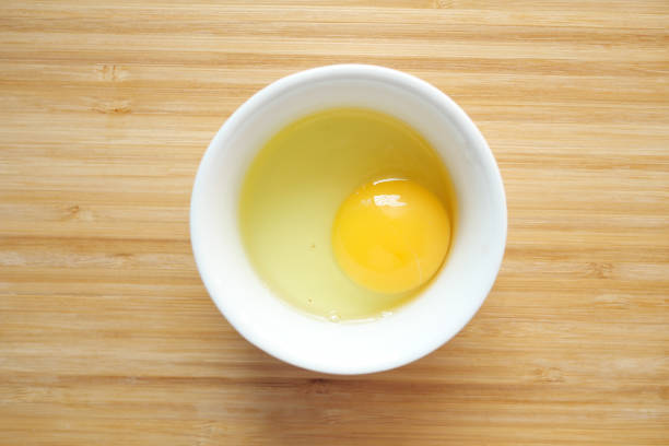 istock Fried eggs in the plate close up , 1446044727