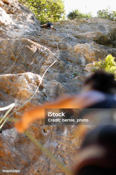 Teamwork Enjoys Climbing Challenges Stock Photo - Download Image Now - Achievement, Active Lifestyle, Adults Only