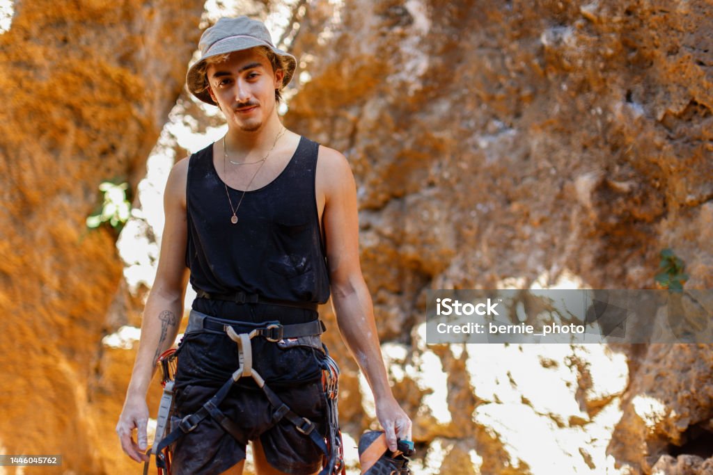 Portrait of rock climbing man Portrait of man having fun with rock climbing challenge outdoors Achievement Stock Photo