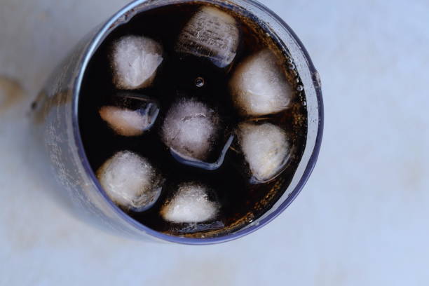 istock glass with ice and black soda. Beverage concept. 1446047067