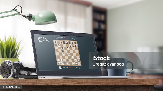 istock User playing chess online on the laptop 1446047836
