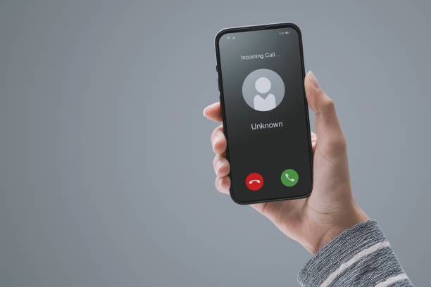 istock Woman receiving a call from an unknown user 1446048279