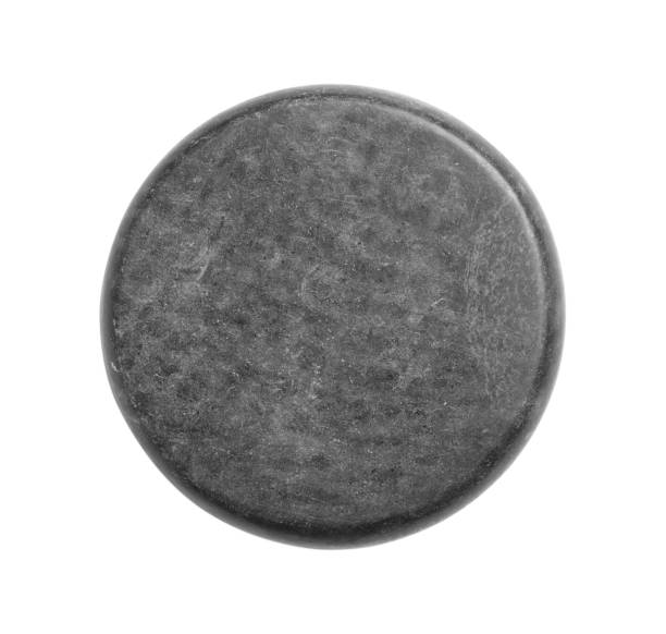 istock Grey spa stone isolated on white, top view 1446049804