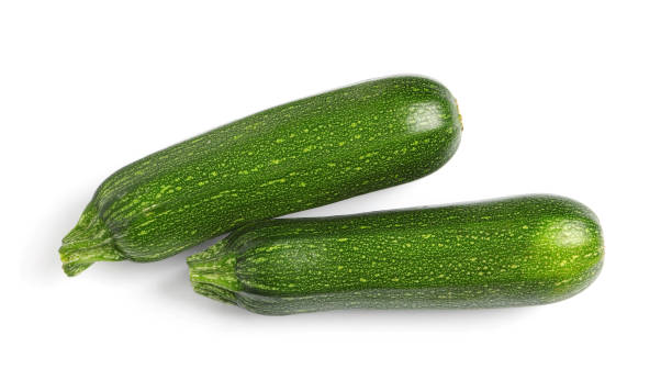 istock Raw ripe zucchinis on white background, top view 1446049830