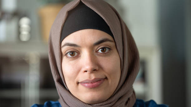 istock Woman looking at camera and wearing a hijab 1446050655