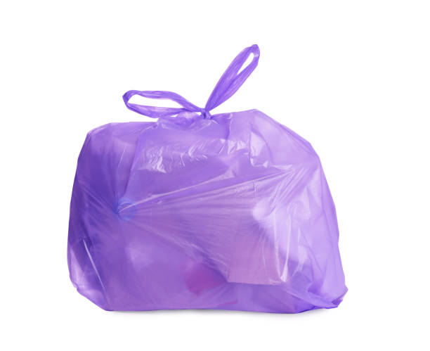 Full violet garbage bag isolated on white. Rubbish recycling Full violet garbage bag isolated on white. Rubbish recycling utilize stock pictures, royalty-free photos & images