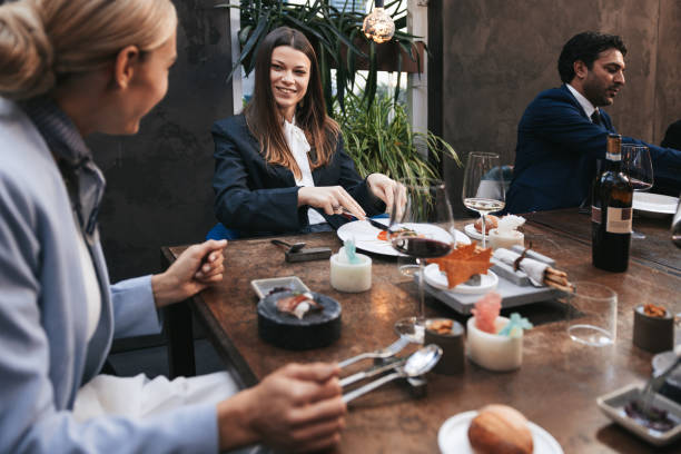 istock Business people dining in a luxury restaurant 1446053249