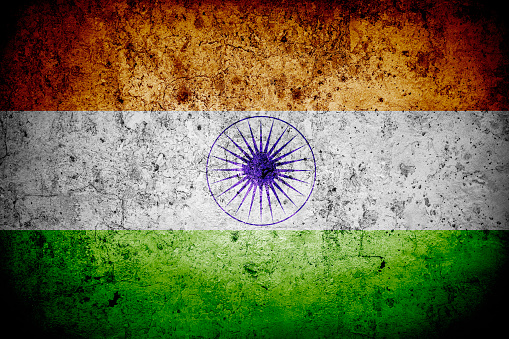 Flag of India with faded grunge effect and vignette, perfect for backgrounds and design.