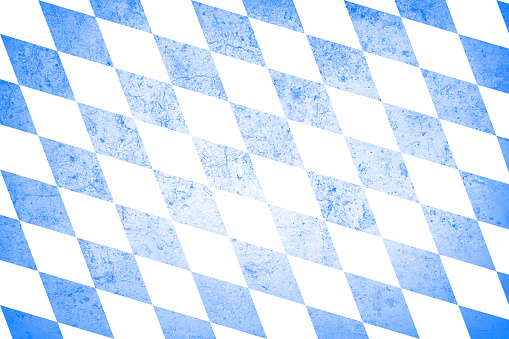 Close POV image of a Blue checkered gingham cloth showing lines of perspective into the distance.