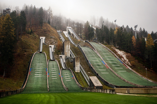 Ski jumping venue or a hill during autumn in Slovenia.