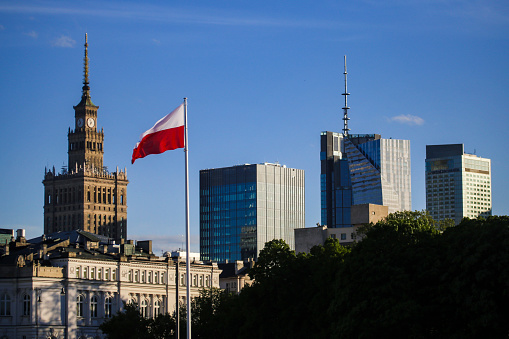 Flag of Poland in front of downtown Warsaw, Poland.