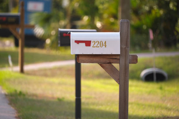 istock Typical american outdoors mail box on suburban street side 1446061537