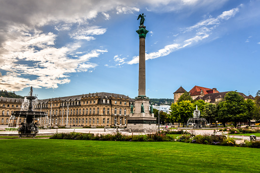 Grass Near Schlossplatz, Jubilee Column And Fountain In Stuttgart, Germany