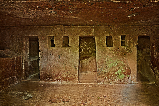 Viterbo, Lazio, Italy: Etruscan necropolis of San Giuliano, the ancient porch tombs, 2500 years old, carved in the tufa rock in Marturanum regional park, near the towns of Barbarano Romano and Blera