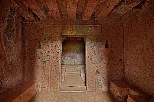 Barbarano Romano, Viterbo, Lazio, Italy: Etruscan necropolis of San Giuliano, interior of an ancient tomb, 2500 years old, with the symbol of the door to the afterlife and the reproduction of the ceiling beams of an house